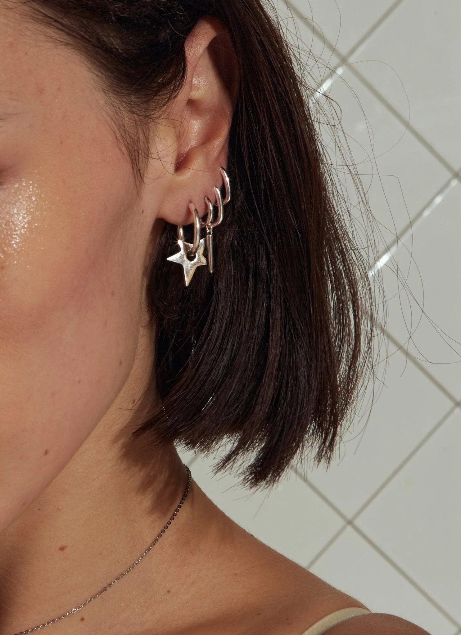 Home 11 Star Earrings in Silver